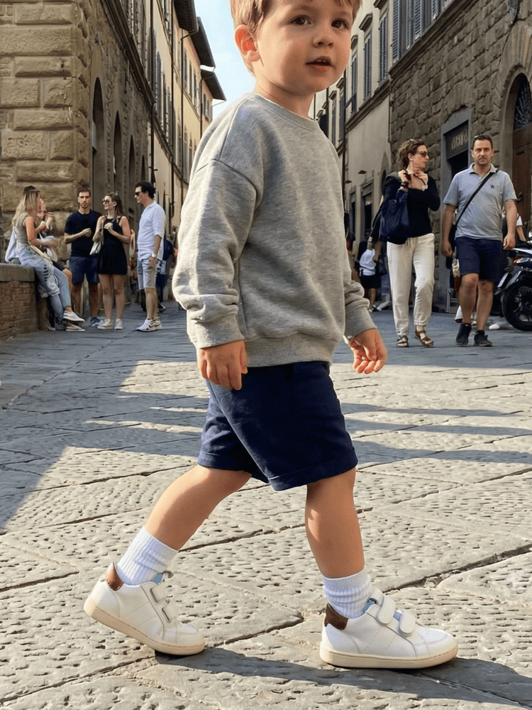 Bambino che cammina con scarpe primi passi Barberini