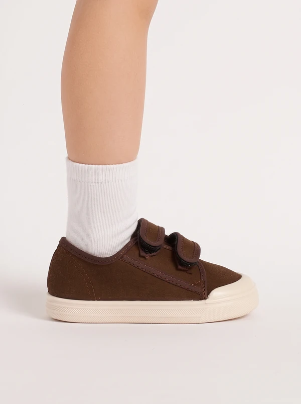 Scarpa primi passi classica marrone Dondi Era Fango indossata con calzino in cotone