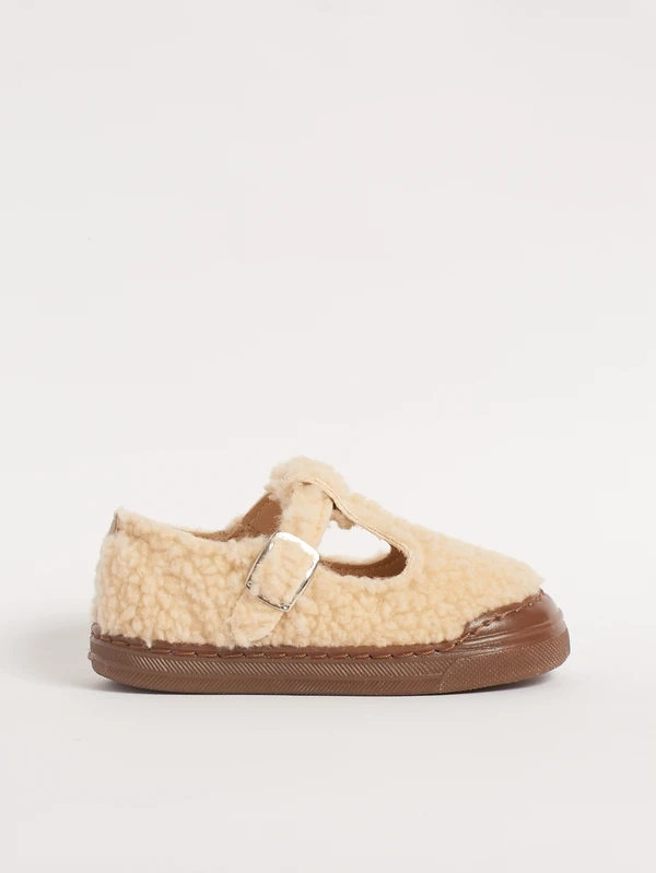 Scarpina teddy Barberini beige modello Pomino vista laterale con puntale protettivo marrone e fibbia a clip